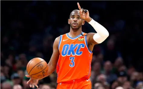  ?? AP PHOTO/MICHAEL DWYER ?? In this March 8 photo, Oklahoma City Thunder’s Chris Paul plays against the Boston Celtics during an NBA basketball game in Boston.