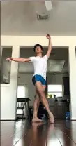  ?? XINHUA ?? Chun Wai Chan, a principal dancer with Houston Ballet, dances during an online class amid the COVID-19 pandemic in Houston.