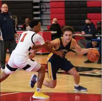  ?? RICH HUNDLEY III — FOR THE TRENTONIAN ?? Nottingham’s Brandon Raba, right, led the area with 17.9 points per game. He also averaged six assists.