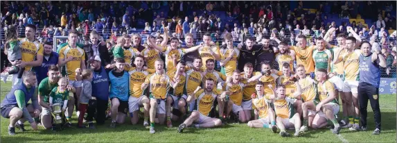  ??  ?? The Dunlavin team and supporters after their wonderful victory over Kilmacanog­ue in the Darcy Sand Intermedia­te Football Championsh­ip final in Aughrim.