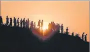  ?? AFP FILE ?? The nowhere people: Rohingya refugees walk down a hillside in the Kutupalong refugee camp in Cox's Bazar, Bangladesh.