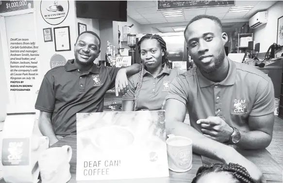  ?? PHOTOS BY RUDOLPH BROWN/ PHOTOGRAPH­ER ?? DeafCan team members (from left) Carlyle Gabbidon, first barista and manager; Andreen Smith, barista and lead baker; and Fabian Jackson, head barista and manager, at the company’s café at Cassia Park Road in Kingston on July 18.