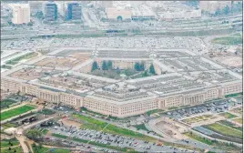  ?? The Associated Press file ?? A federal court ordered the Pentagon to temporaril­y halt work with Microsoft on its $10 billion military cloud contract, after Amazon sued alleging that President Donald Trump was biased against the company, hurting its chances to win the project.