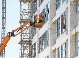  ?? KEVIN RICHARDSON/BALTIMORE SUN ?? Constructi­on work continues at Port Covington on Tuesday.