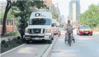  ?? JACK LAKEY FOR THE TORONTO STAR ?? One reader lamented the lack of city planning to accommodat­e delivery trucks and service repairs on streets with bike lanes.