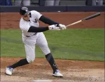  ?? KATHY WILLENS - THE ASSOCIATED PRESS ?? New York Yankees’ Aaron Judge strikes out on a pitch from Tampa Bay Rays relief pitcher Ryan Yarbrough during the fifth inning of a baseball game, Sunday, April 18, 2021, at Yankee Stadium in New York.