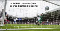  ?? ?? IN FoRM: John McGinn scores Scotland’s opener