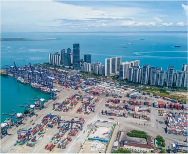  ?? [Photo] ?? This aerial photo taken on Sept 12, 2023 shows a view of the container terminal of Haikou Port in Haikou, South China's Hainan province.