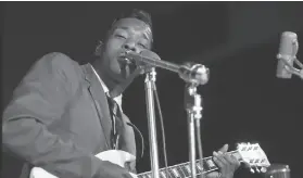  ?? Raeburn Flerlage / Chicago History Museum ?? Buddy Guy performs at the University of Chicago in 1966. His formidable blues career is the subject of a new PBS “American Masters” documentar­y.