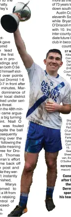  ?? Photo by Stephen Kelleghan ?? Conor O’Shea of St Mary’s after being presented with the Jack Murphy Cup by Dermot Walsh, from main sponsor SuperValu, after his team retained the South Kerry SFC title.