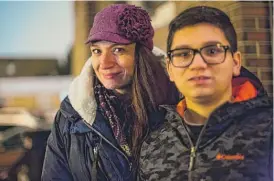  ?? JAMES FOSTER PHOTOS/FOR THE SUN-TIMES ?? Griselda Silva, with her son Sebastian Ayala, said the news about Santa Lucia felt like a punch to the gut: “I’m still trying to digest this.”