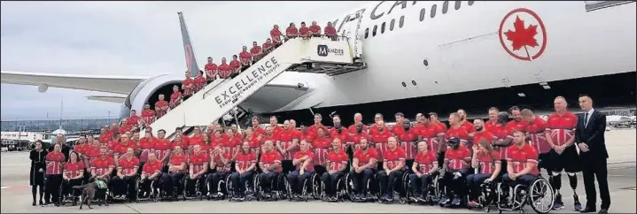  ??  ?? Former Royal Artillery serviceman, train driver Steve Cokayne from Hinckley, at top of steps, second from right, with the UK team that competed in the Invictus Games in Toronto, Canada, September 2017. Picture: Help For Heroes