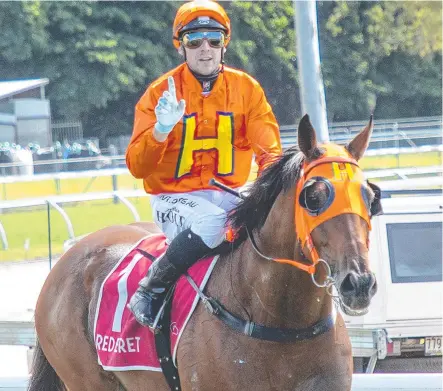  ?? Picture: MIKE MILLS ?? WEIGHTY ISSUE: Townsville jockey Aidan Holt returns to scale on North Queensland Cups champion The Harrovian after a monumental victory at Cairns' Cannon Park despite carrying a whopping 67kg.