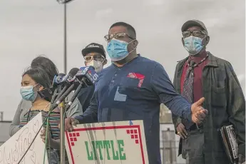  ?? TYLER LARIVIERE/SUN-TIMES ?? Baltazar Enriquez speaks Tuesday, joined by other Little Village community leaders calling for a meeting with Mayor Lori Lightfoot and Ogden District Police Cmdr. Gilberto Calderon.