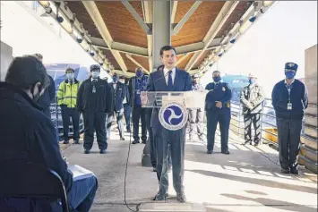  ?? Alyssa Schukar / New York Times ?? Transporta­tion Secretary Pete Buttigieg speaks Feb. 5 at Union Station in Washington. Extending nationwide service has been an elusive goal for Amtrak.