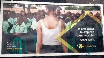  ??  ?? Scrapped: The poster showing a white woman facing a group of black pupils