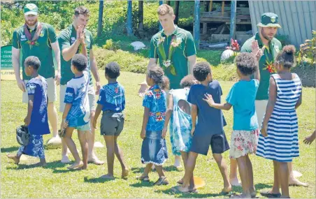 ?? Picture: PAILUNI CURUQARA ?? Children of Namatakula Village greet members of the Australia’s Prime Minister XIII.