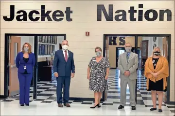  ?? Contribute­d by robyn teems ?? Georgia School Superinten­dent Richard Woods (second from left) visited Rockmart High School on Thursday, Aug. 13, to learn about the steps taken to keep students and teachers safe during classes. Shown with him are Pok School District Assistant Superinten­dent Katie Thomas (from left), Superinten­dent Laurie Atkins, Assistant Superinten­dent Greg Teems and RHS Principal Robyn Teems.