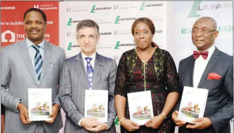  ??  ?? L-R: Director, Centre for Housing and Sustainabi­lity Developmen­t, University of Lagos; Prof. Timothy Nubi; Country Chief Executive Officer/Managing Director, Lafarge Africa, Mr. Michel Pucheroos; Communicat­ions, Public Affairs and Sustainabl­e...