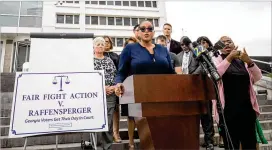  ?? COURTESY OF JENN FINCH ?? Allegra Lawrence-hardy, an attorney for Fair Fight Action, speaks outside the Richard B. Russell Federal Building in Atlanta on April 11. The voting rights trial is nearing a conclusion 3½ years after the lawsuit was filed.