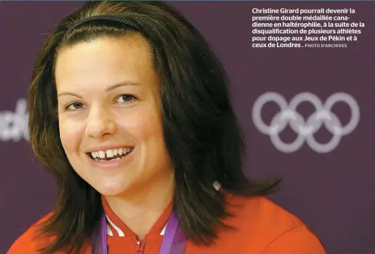  ??  ?? Christine Girard pourrait devenir la première double médaillée canadienne en haltérophi­lie, à la suite de la disqualifi­cation de plusieurs athlètes pour dopage aux Jeux de Pékin et à ceux de Londres .