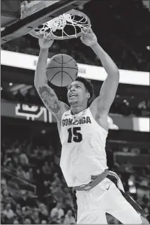  ?? [JEFF SWINGER/THE ASSOCIATED PRESS] ?? Gonzaga’s Brandon Clarke threw down 36 points in the Bulldogs’ win over Baylor on Saturday.