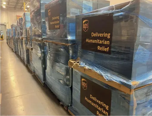  ??  ?? UPS delivering humanitari­an aid.