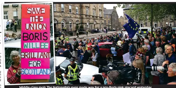  ??  ?? Middle-class mob: The Nationalis­ts even made way for a pro-Boris pink placard yesterday