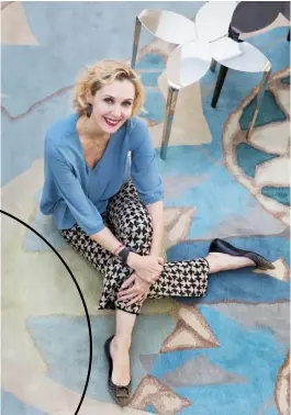  ??  ?? Portrait Interior designer Allegra Hicks sits on the softly-hued ‘Lantern’ rug she designed specially for this house Living room The central ‘SA05’ coffee table is by Sottsass Associati for Laura Meroni, while the sofas are covered in neutral fabrics by Allegra. The sofa by Julio Katinsky is covered with a 1960s fabric by Silvia Nayla Stockist details on p269