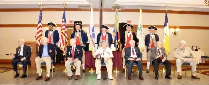  ?? SUBMITTED PHOTO ?? Members of the 83rd Infantry Division: From left: Chester Kochan, Wayne Kunkel, Al Klugiewicz, Fred Pearson, Art Jacobsen, Frank Horvath, Andre Beaumont. Sons of the American Revolution Honor Guard behind.