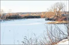  ?? ADAM MACINNIS/THE NEWS ?? The East River appeared calm on Wednesday, but that can change drasticall­y when the ice melts.