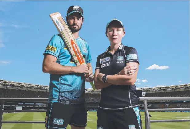  ??  ?? TOUGH ASSIGNMENT: The Brisbane Heat’s Ben Cutting and Beth Mooney ahead of today’s must-win matches. Picture: MARK CRANITCH