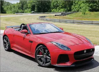  ?? MICHAEL TERCHA / CHICAGO TRIBUNE / TNS ?? The 2018 Jaguar F-Type SVR convertibl­e is fast — 0-60 in 3.5 seconds — but most importantl­y, it is adaptive to the driver.