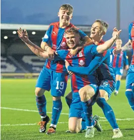  ??  ?? Scott Allardice celebrates his goal that sealed victory for Caley