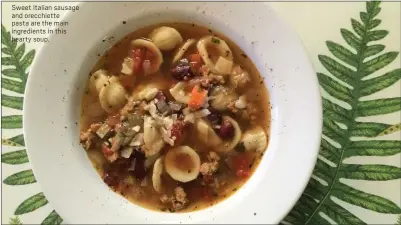  ?? PHOTOS BY CATHY THOMAS ?? Sweet Italian sausage and orecchiett­e pasta are the main ingredient­s in this hearty soup.