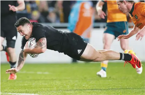  ?? PICTURES: Getty Images ?? Too easy: Hooker Codie Taylor dives over to score for New Zealand