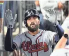  ?? RICHARD MACKSON/USA TODAY SPORTS ?? Braves right fielder Nick Markakis leads the NL in batting average and hits.