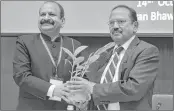  ??  ?? NSA Ajit Doval being greeted by NIA Director General Yogesh Chander Modi during the NA's national conference in New Delhi.