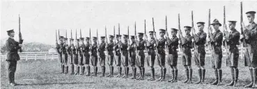  ?? COPIES OF PICTURE AVAILABLE FROM ODT FRONT OFFICE, LOWER STUART ST, OR WWW.OTAGOIMAGE­S.CO.NZ ?? A squad of OBHS cadets engaged in rifle exercise. — Otago Witness, 19.9.1917.