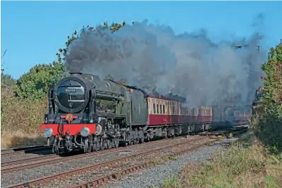  ?? ?? Running underneath the Marylebone line at Aynho Junction, No. 46100 heads for Oxford. JOHN TITLOW