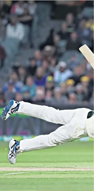  ??  ?? Close shave: Joe Root’s inside edge eludes the diving Cameron Bancroft