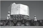  ?? DANIEL COLE/AP ?? Part of a massive magnet for the fusion project is seen in Berre-l’etang, France, Monday. It arrived at the project site Thursday.