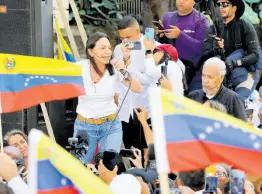  ?? AP ?? Opposition coalition presidenti­al hopeful María Corina Machado speaks to supporters at a campaign event in Caracas, Venezuela.
