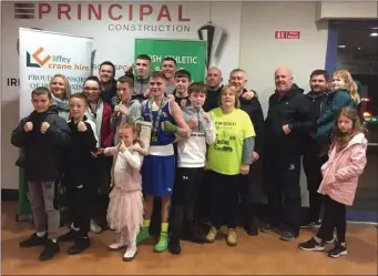  ??  ?? Regan Buckley from St Teresa’s Boxing Club in Bray with his family and supporters after he won the Irish U-22 title last weekend.