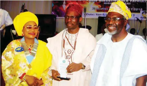  ??  ?? L-R: Newly installed District 911 Inner Wheels Nigeria, Adegbemiso­la Fathiat Amoke Rufai; Guest Speaker, Prof. Olanrewaju Adigun Fagbohun; and Celebrant’s husband, Biodun Rufai, at the installati­on of Rufai in Ikeja, Lagos ...weekend