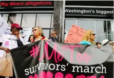  ?? DAMIAN DOVARGANES/THE ASSOCIATED PRESS ?? Participan­ts rally outside CNN’s Hollywood studios on Sunset Boulevard to take a stand against sexual assault and harassment for the #MeToo March in Los Angeles. A spate of recent public revelation­s, including the spontaneou­s #metoo discussion­s on...