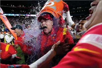  ?? MATT SLOCUM — THE ASSOCIATED PRESS ?? Kansas City Chiefs head coach Andy Reid is dunked after their win against the Philadelph­ia Eagles at Super Bowl 57on Sunday, in Glendale, Ariz.