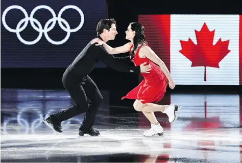  ?? MLADEN ANTONOV/AFP/GETTY IMAGES ?? Scott Moir and Tessa Virtue perform during the figure skating gala in Gangneung on Sunday. The full 17-member figure skating team was Canada’s most productive of any Games with four medals. “It’s fulfilling that our hard work was rewarded,” said Virtue.
