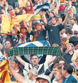  ??  ?? The Tartan Army show their support for Scotland during their Euro ‘96 opening clash with Holland.