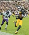  ?? GENE J. PUSKAR/AP ?? The Steelers’ George Pickens heads for the end zone against the Ravens.